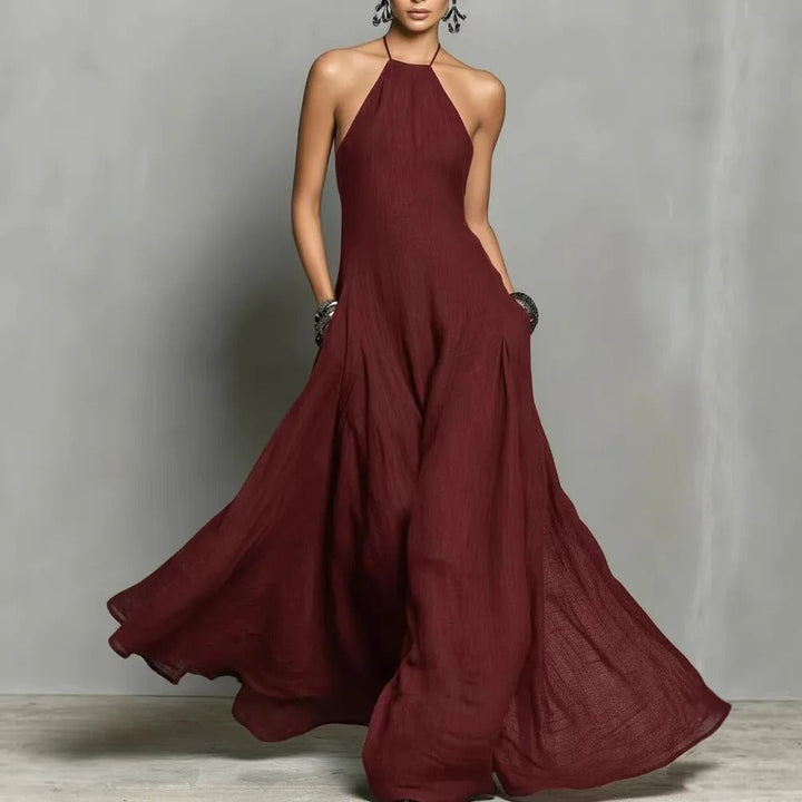 Elegant women's halter neck maxi dress, a sleeveless design perfect for special occasions & summer style.