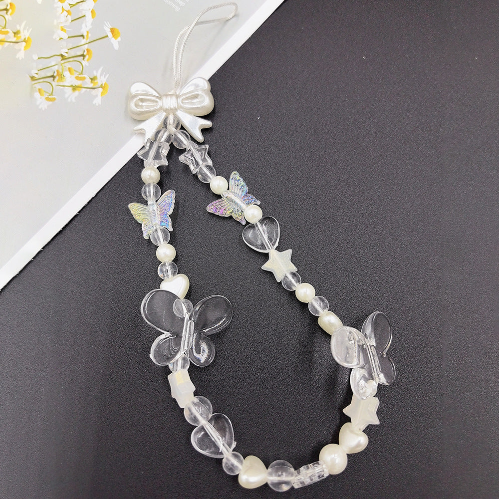 Elegant women's handmade beaded choker necklace. Features unique pearl and star beads. Fashion accessory.
