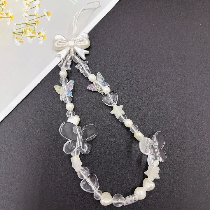 Elegant women's handmade beaded choker necklace. Features unique pearl and star beads. Fashion accessory.