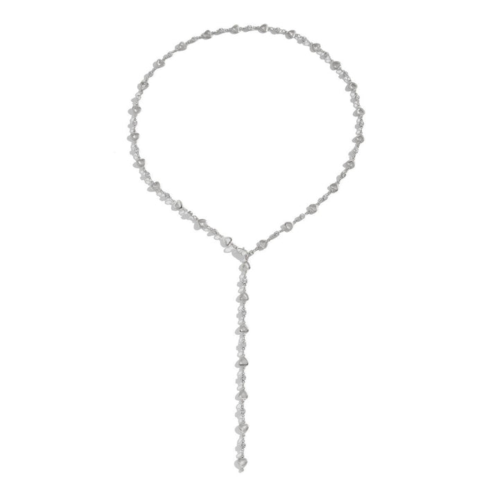 Close-up of elegant women's heart gemstone choker necklace, sparkling adjustable jewelry design.