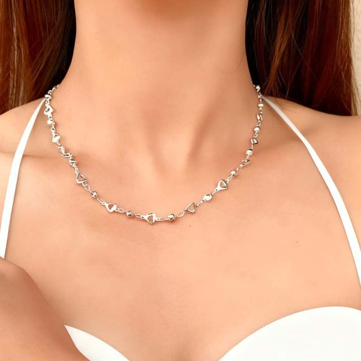 Modern women's heart gemstone choker necklace, elegant adjustable alloy jewelry for everyday wear.