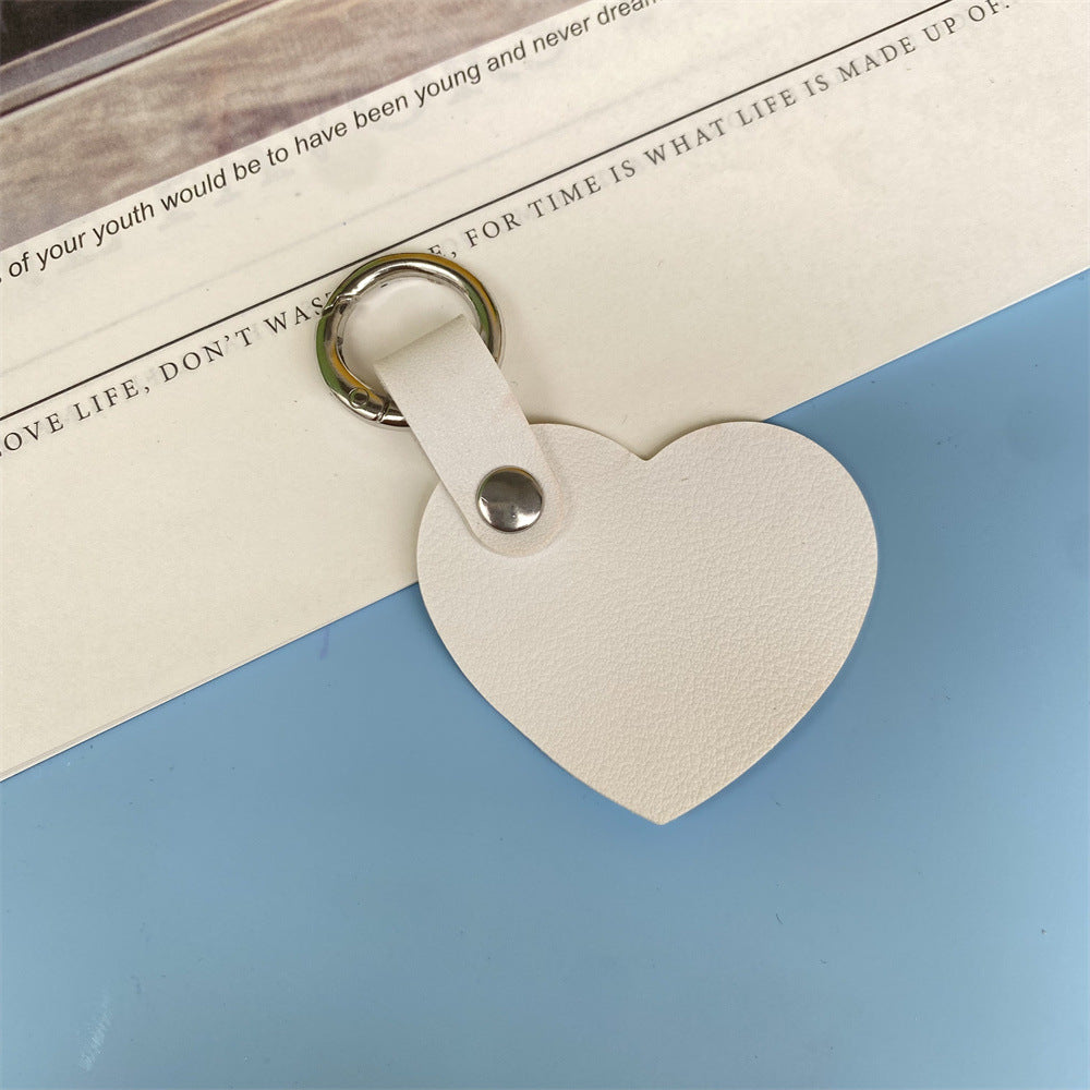 Premium heart leather keychain for women, a stylish and durable accessory.