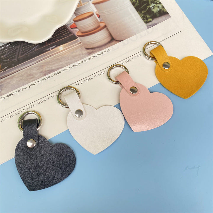 Durable leather heart keychain for women, a charming keyholder gift.