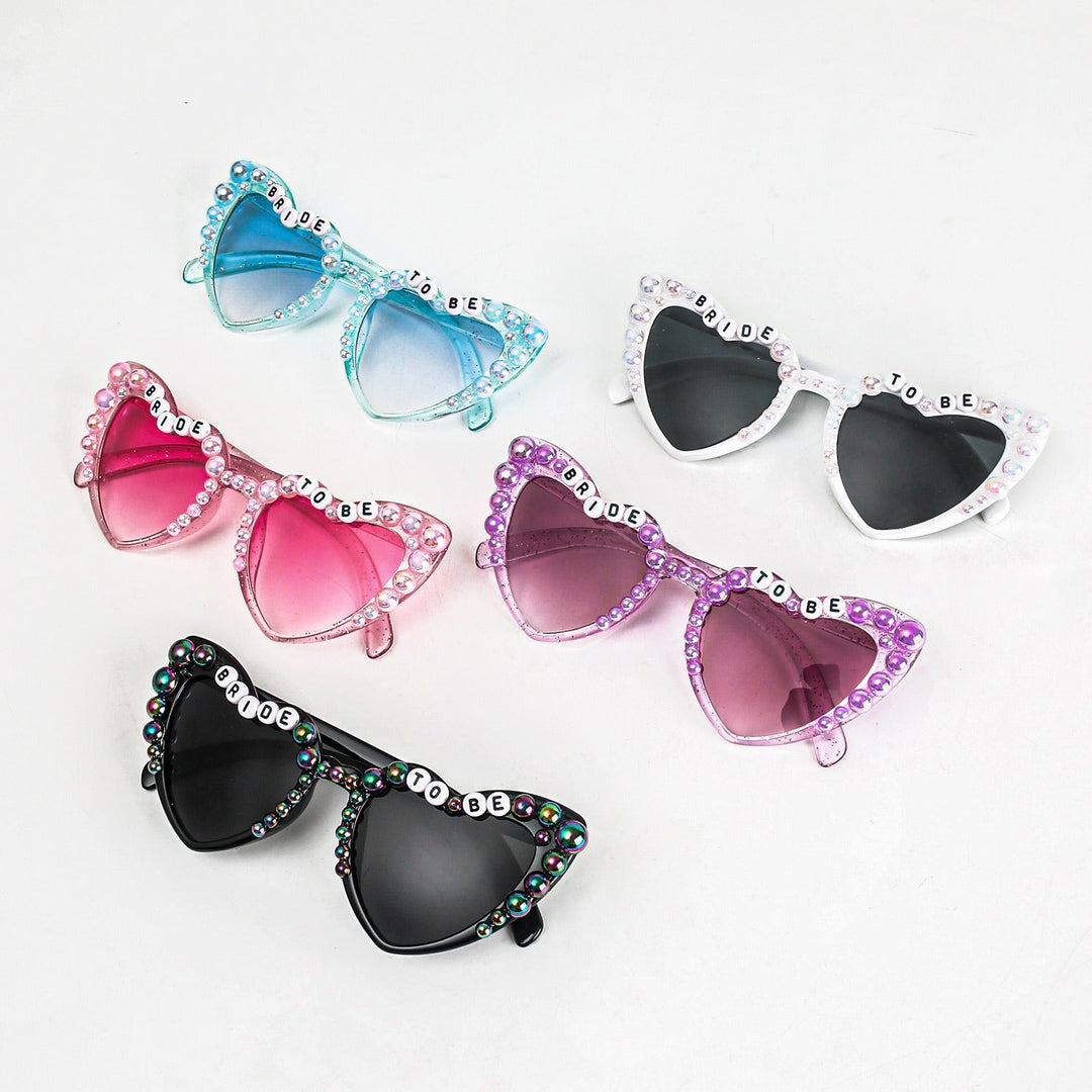 Women's heart-shaped party sunglasses with UV protection, a perfect fashion accessory.