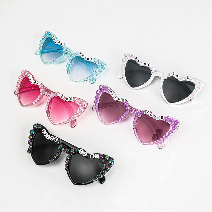 Women's heart-shaped party sunglasses with UV protection, a perfect fashion accessory.