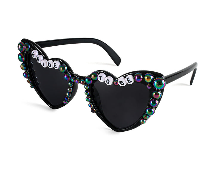 Unique heart-shaped fashion sunglasses for women, perfect party accessory with UV protection.