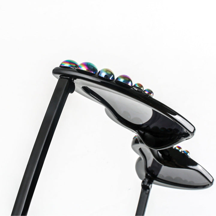 Stylish women's heart-shaped party sunglasses with advanced UV protection.