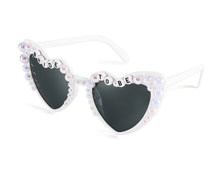 Chic heart-shaped women's sunglasses, ideal party and fashion accessory with UV protection.
