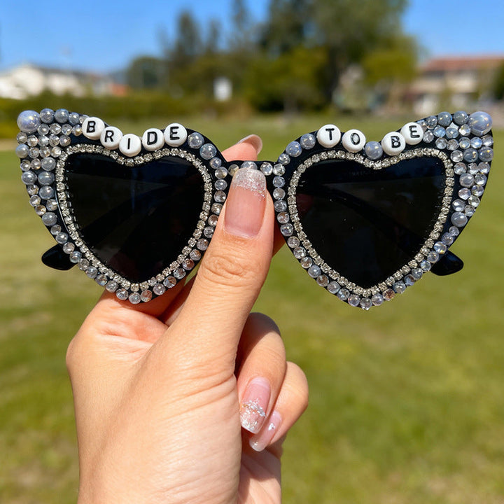 Women's stunning heart sunglasses with pearl trim & UV shield. Elevate your summer accessories.