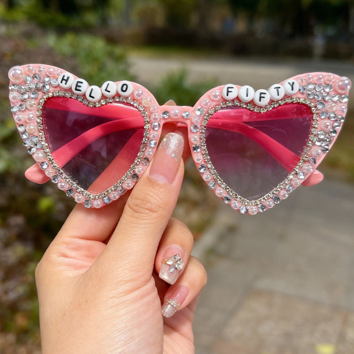 Stylish women's sunglasses: unique heart design with pearls & UV protection. Summer accessory.