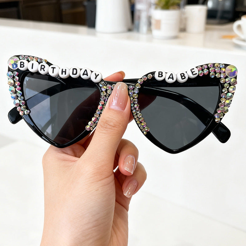 Trendy heart statement sunglasses for women, offering fashionable UV protection and a unique design.