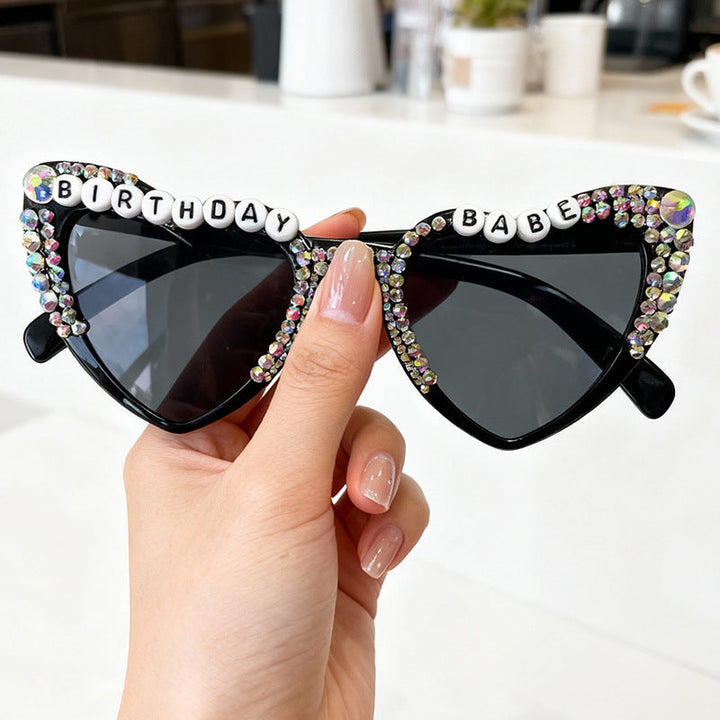 Trendy heart statement sunglasses for women, offering fashionable UV protection and a unique design.