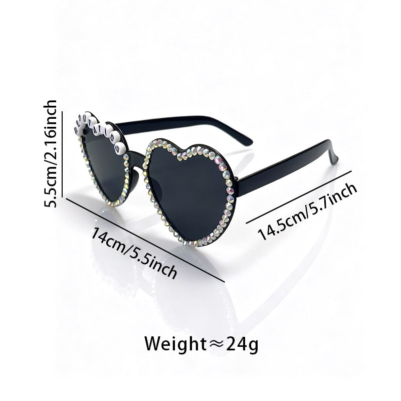 Stylish women's heart sunglasses, rhinestone embellished for a glamorous, trendy look. Offers UV protection.
