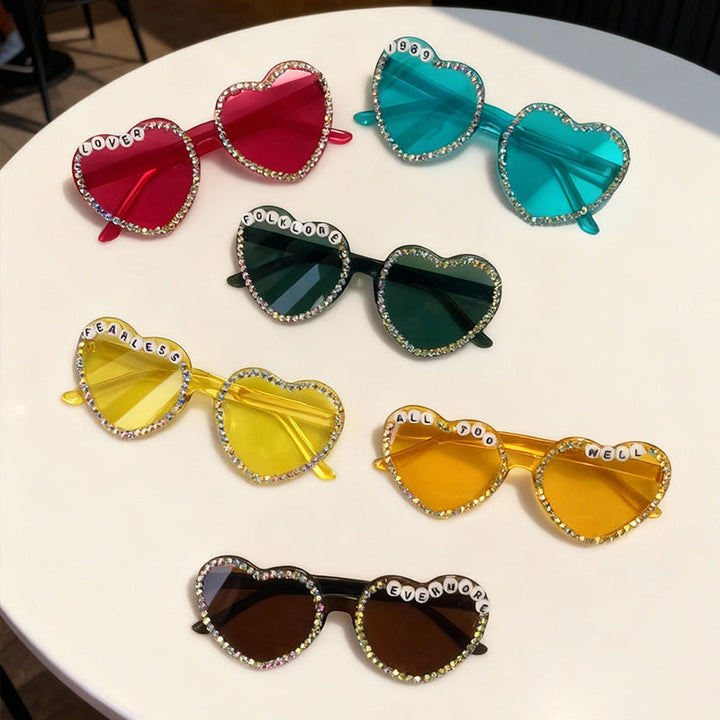 Glam women's heart sunglasses with rhinestone details, offering trendy style and UV eye protection.