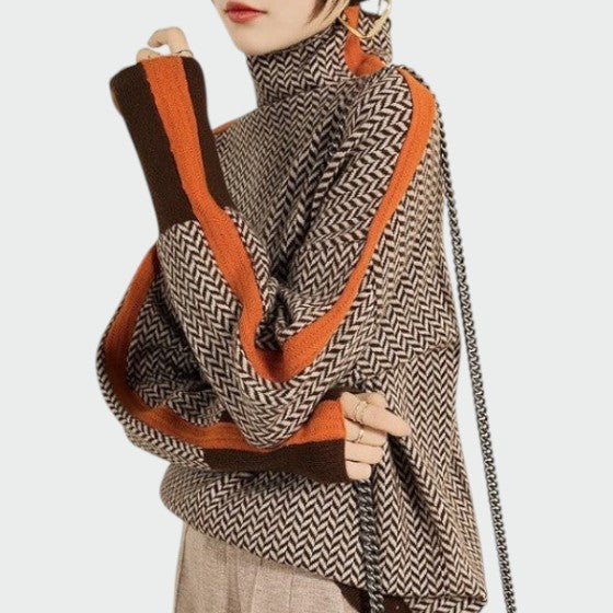 Women's herringbone turtleneck sweater. Elegant fall fashion top for versatile styling and comfort.
