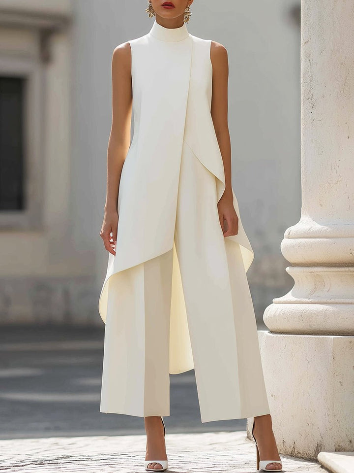 Women's high neck asymmetric sleeveless top & wide-leg trouser set in professional style.