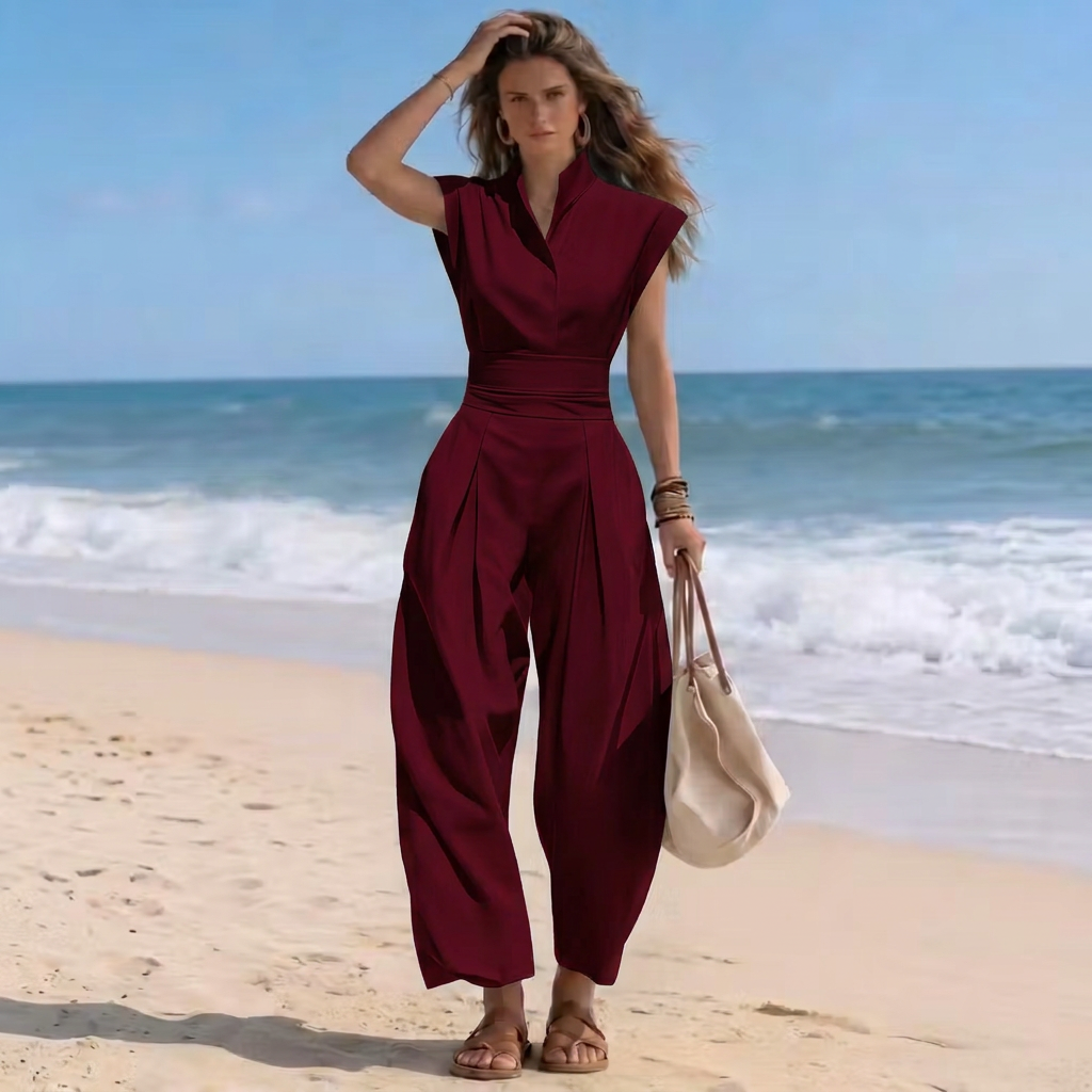 Versatile women's one-piece high-neck cap-sleeve harem jumpsuit with a stylish ruched waist.