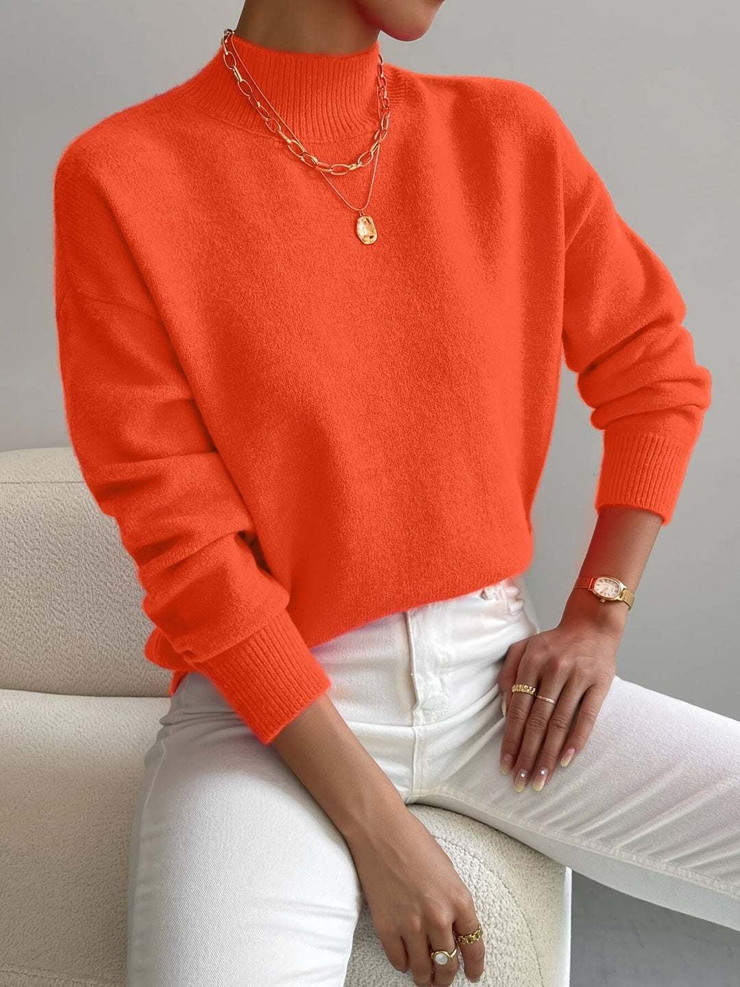 Classic women's high neck long sleeve jumper. Timeless knit pullover for cool weather.