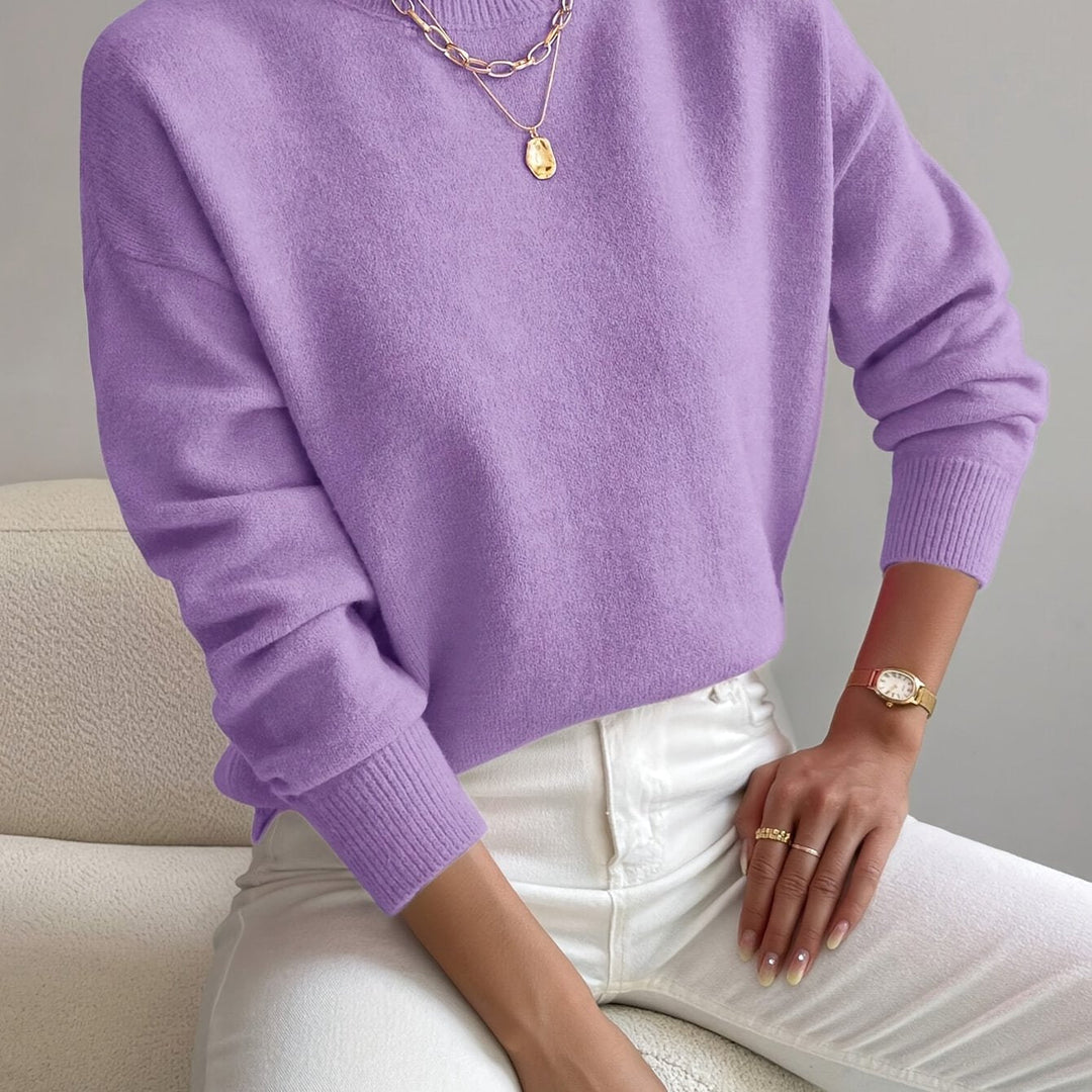 Ladies' high neck long sleeve knit pullover. Perfect for a cozy yet elegant autumn look.