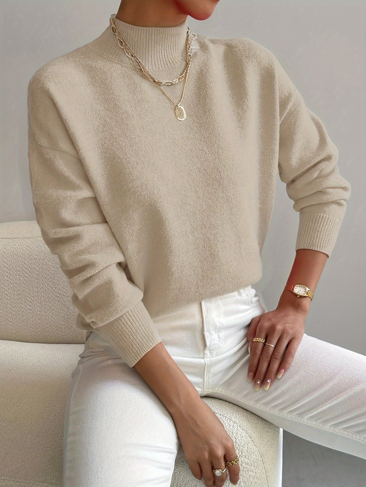Soft knit high neck jumper for women. Elegant & warm winter pullover, perfect for layering.