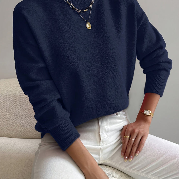 Autumn winter women's high neck long sleeve top. Comfortable knit for elegant casual style.