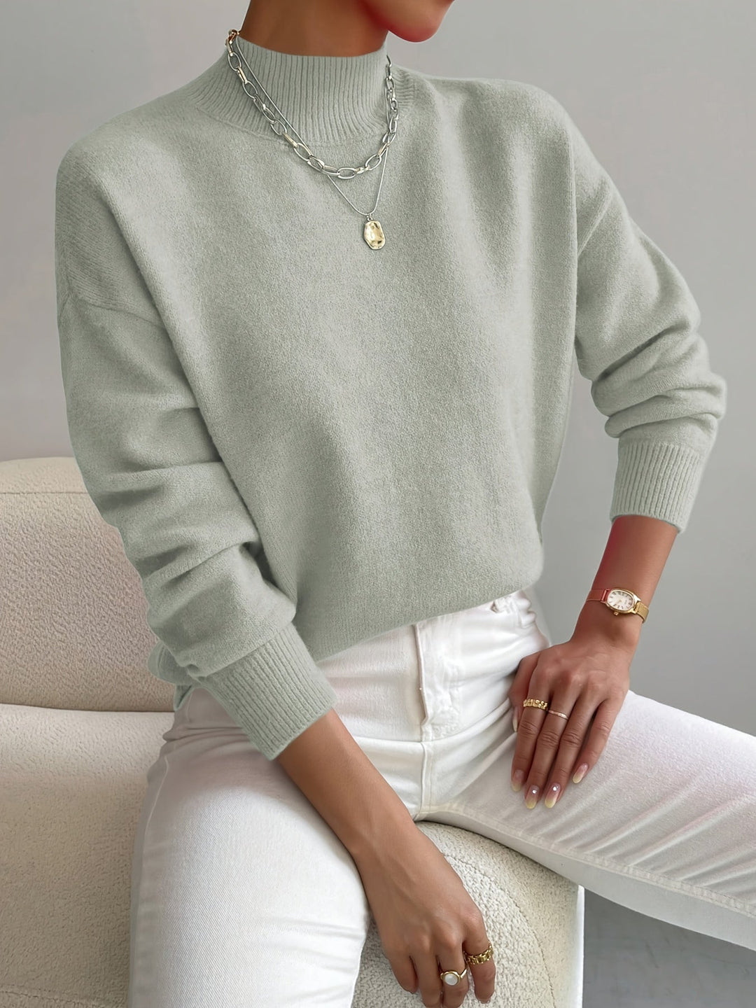 Ladies' long sleeve high neck knitted sweater. Casual & comfortable autumn winter top.