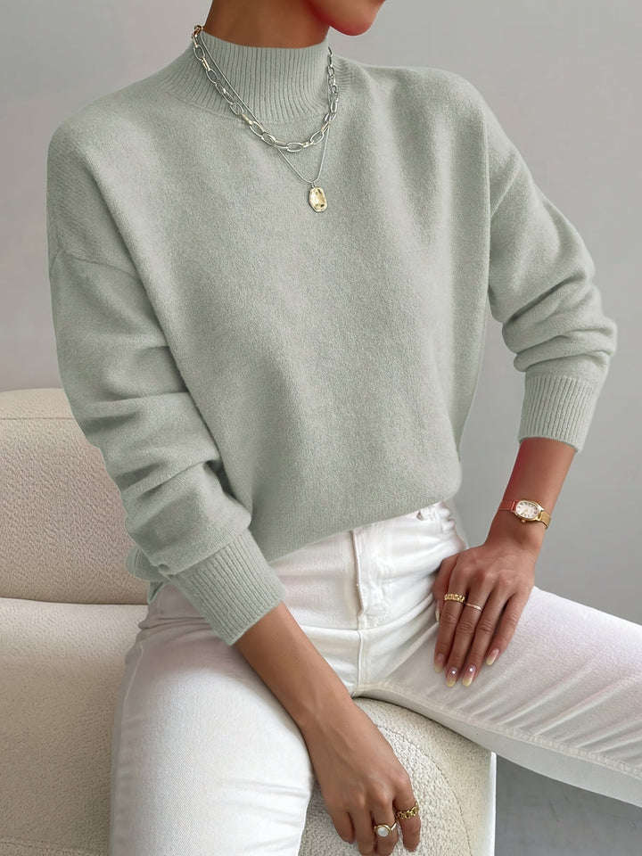 Ladies' long sleeve high neck knitted sweater. Casual & comfortable autumn winter top.
