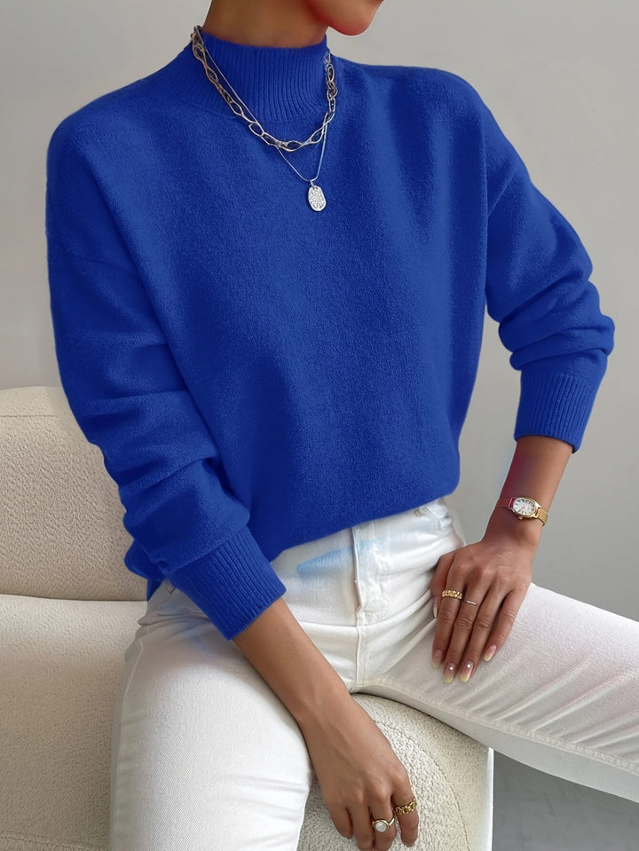 Autumn winter women's high neck sweater. Soft knit long sleeve top for daily comfort.