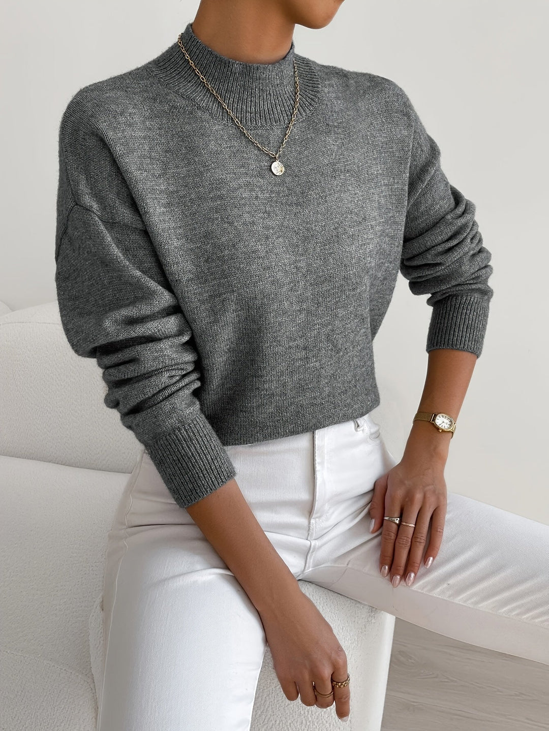 Cozy women's high neck long sleeve jumper. Essential soft knit for autumn & winter warmth.