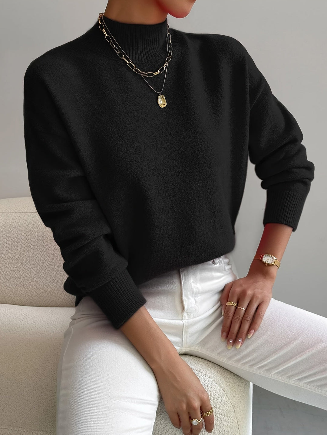 Warm high neck women's knit sweater. Comfortable long sleeve pullover for cold seasons.