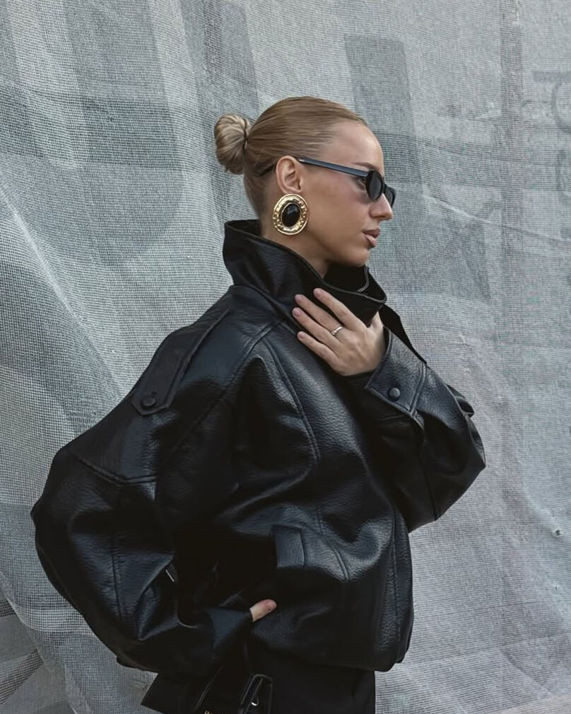 Versatile women's leather jacket with high neck, structured and chic, great for everyday fashion outerwear.