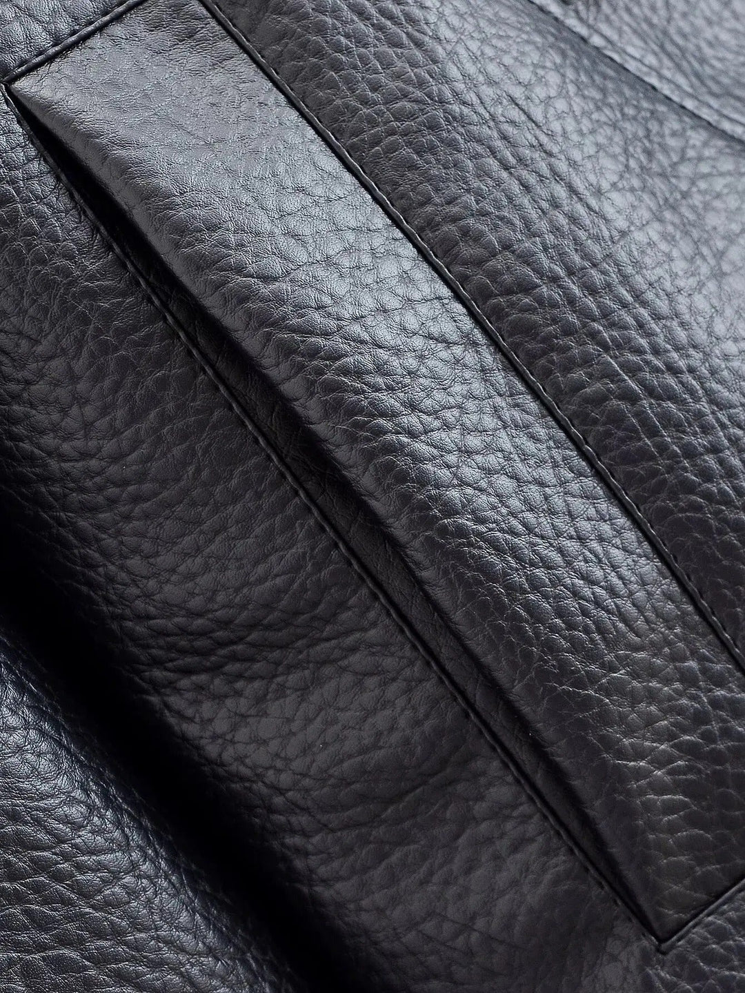 Back view of a women's high neck leather jacket, structured and chic, perfect for versatile everyday fashion.