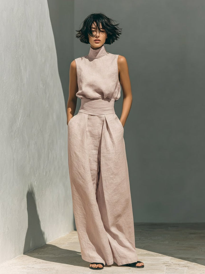 Women's high neck sleeveless top and wide leg pant matching two-piece set. Perfect for casual elegant style.