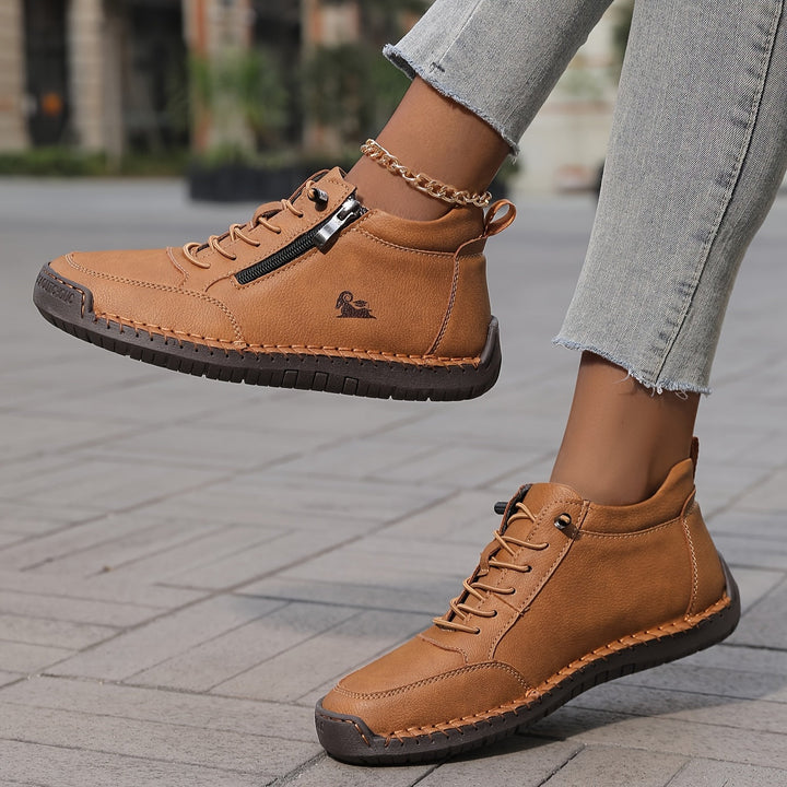 Everyday women's high-top zip-up sneakers, offering supreme comfort & modern style.