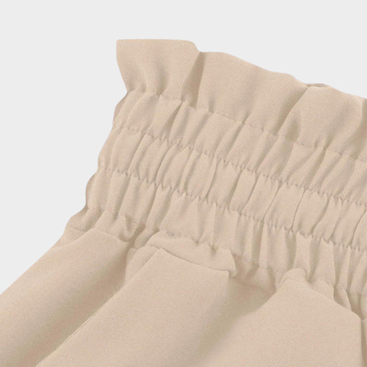 Flattering high-waisted A-line maxi skirt for women, featuring an elastic drawstring waist and practical pockets.