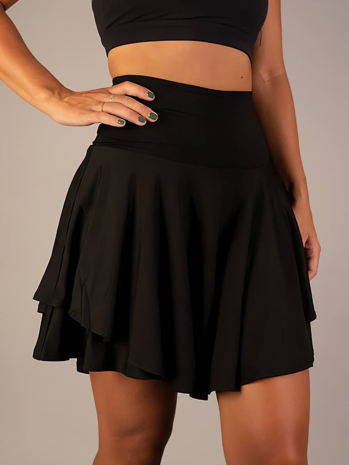 Comfortable women's high-waisted flared active skort, ideal for athletic activities & versatile wear.