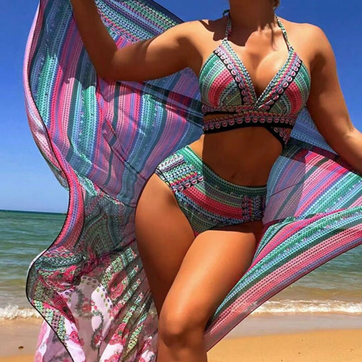 Vibrant printed high waist halter bikini set for women. Trendy two-piece swimwear for summer beach fashion.