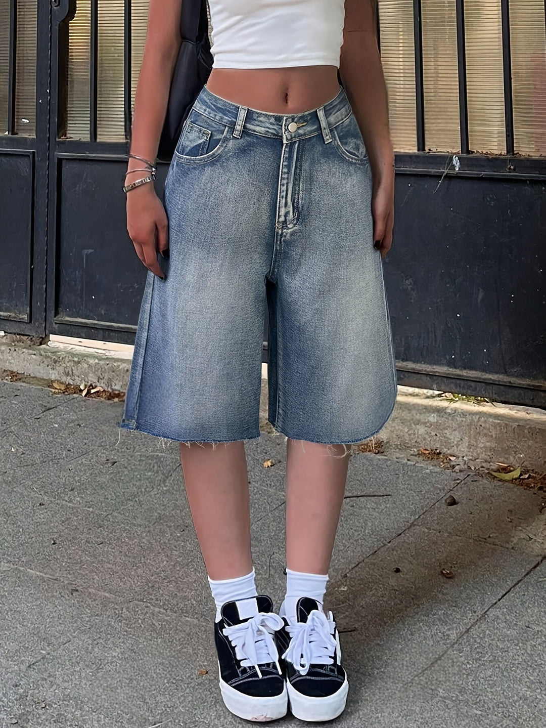 Women's high waist relaxed fit jorts with a wide leg, perfect for casual summer streetwear.