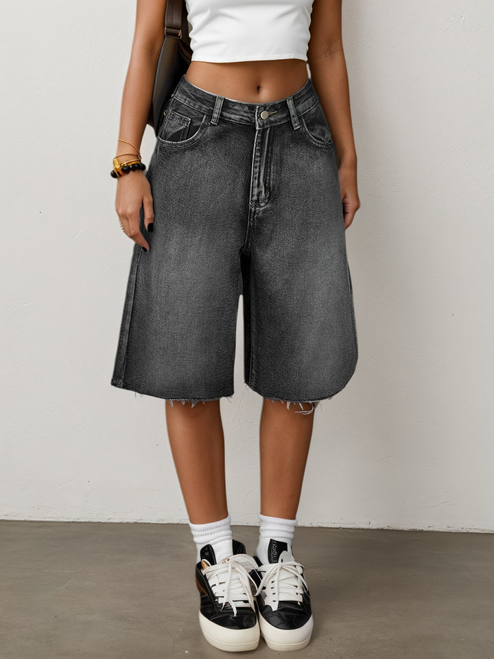 Casual women's high waist denim shorts, wide leg & knee length, offering a relaxed fit for summer wear.