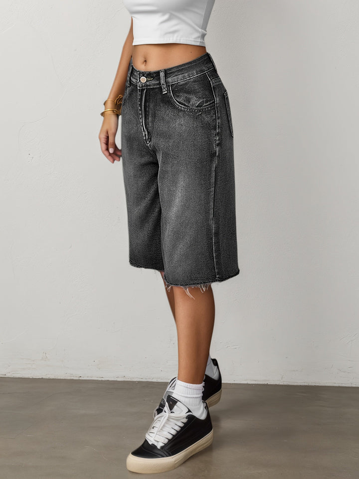 Model wearing women's relaxed fit high waist jorts, wide leg, knee length, in a summer outfit.