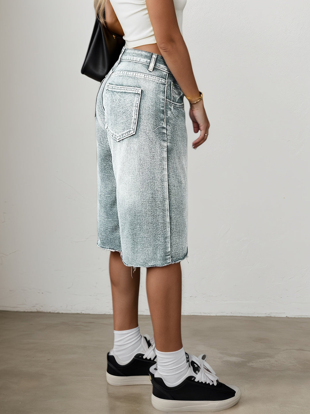 Front view of women's relaxed fit high waist jorts, wide leg, knee length, suitable for summer streetwear.