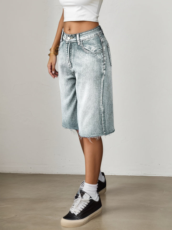 Women's fashion-forward high waist jorts: wide leg, knee length, relaxed fit denim shorts for summer.