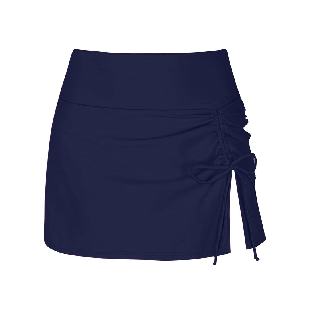 Side view of the women's high-waist ruched swim skirt, showcasing adjustable ties and flattering fit.