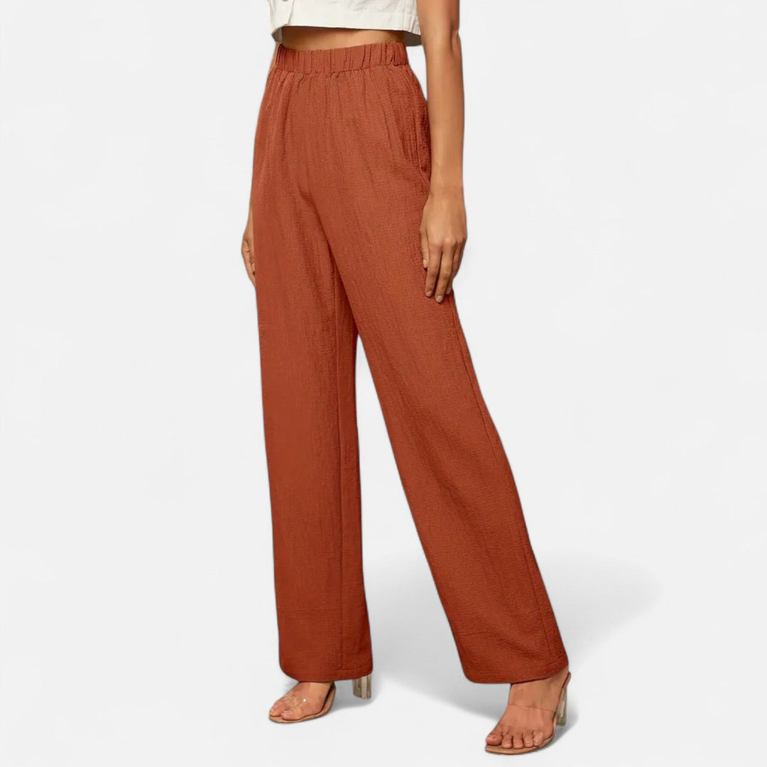 Women's high-waist straight-leg trousers in a classic style, perfect for office wear or elegant casual looks.