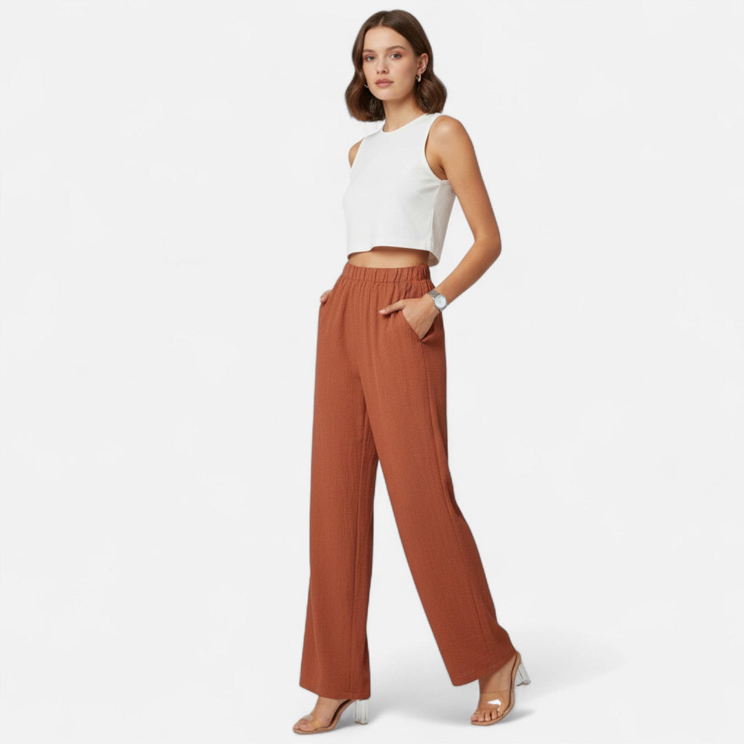 Comfortable ladies' high-waist straight-leg pants, versatile for both formal and everyday outfits.