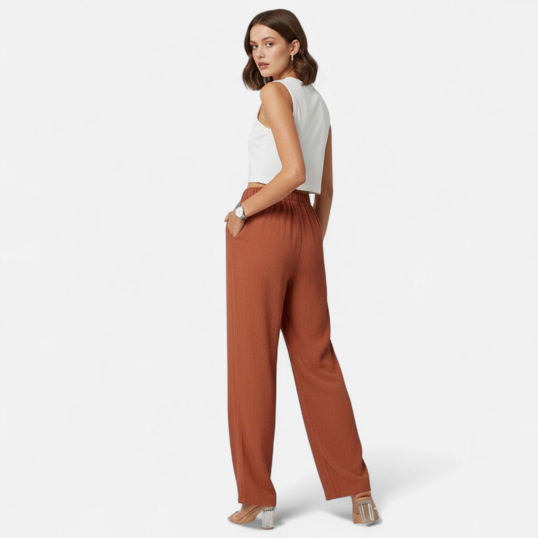 Elegant women's straight-leg trousers with a flattering high-waist, ideal for professional office wear.