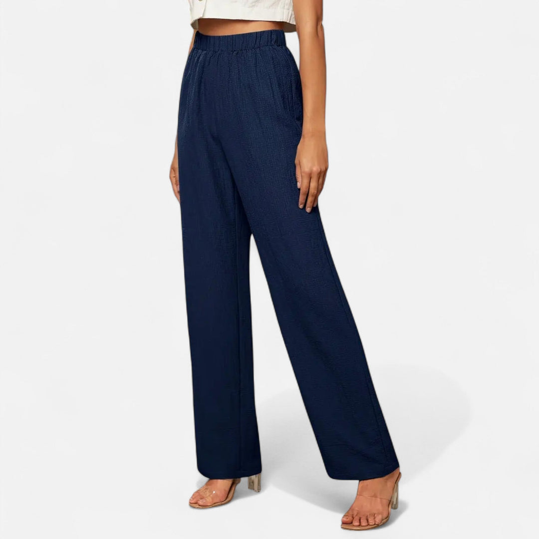 Versatile straight-leg women's pants with a comfortable high-waist design, great for formal or casual wear.
