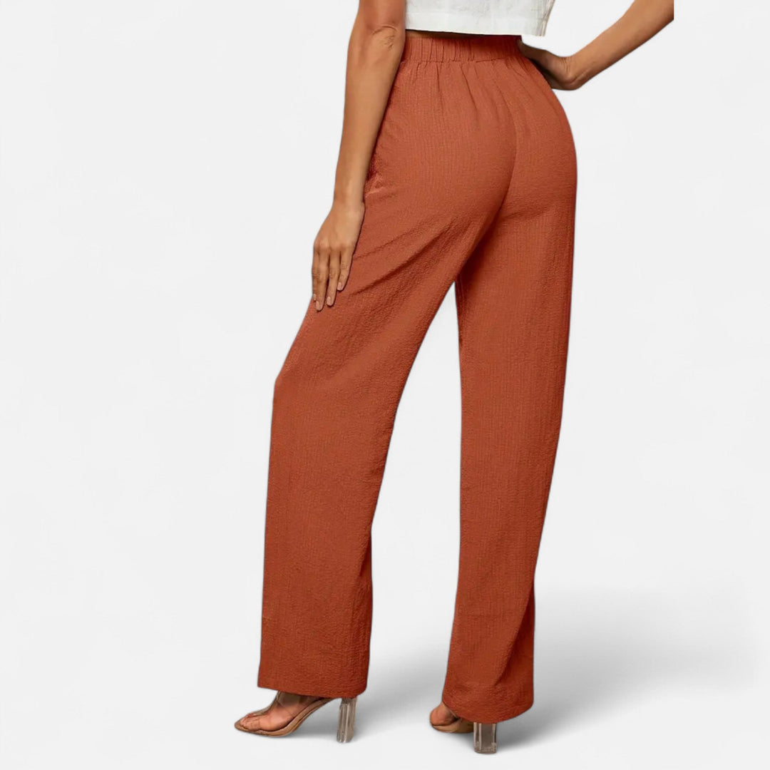 Stylish high-waist straight-leg trousers for women, an elegant and comfortable choice for office or daily wear.