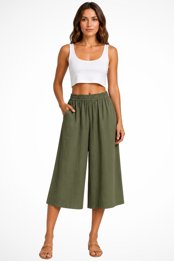 High waist, wide leg, cropped women's trousers with practical pockets. Perfect for relaxed summer fashion.