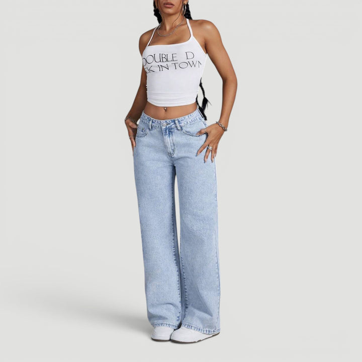 Contemporary women's high waist wide leg denim pants, bow feature.